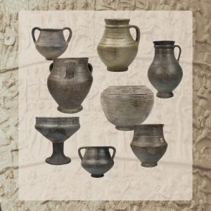 Naczynia gliniane toczone na kole, barwy szarej: dwuuche kubki w typie kantarosa, dzbany, garnki i puchar na nóżce z Lipicy Górnej w Ukrainie.